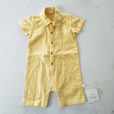 Hallmark Baby Yellow Button Down Romper Suit Size 6-12 Months Nwt - Retail $30 Linen Blend Underarm To Underarm Lying Flat: 11” Length: 21” Yellow Button-up Shirt Dress With Buttons, Cute Yellow Long Sleeve Onesie, Playful Long Sleeve Yellow Onesie, Yellow Cotton Onesie For Playtime, Playful Yellow Short Sleeve Onesie, Romper Suit, Baby Yellow, Linen Blend, Button Downs