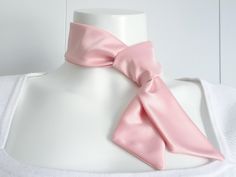 Fashionable slim silhouette, pretty in pink satin scarf / sash for a chic style. Special gift for a bachelorette proposal box. An alternative hair accessory for a flower girl.  Wrap around a low / high bun, ponytail or twine in a stylish braid.   Add a bowknot neck scarf or a satin sash belt to accessorize an ensemble for that unique finishing touch.  A must-have versatile scarf that is a perfect statement accessory for any social event, wedding or everyday casual wear. Many wearable variations Pink Neck Scarf, Pastel Pink Accessories, Bachelorette Proposal, High Bun Ponytail, Scarf Purse, Bun Ponytail, Satin Scarf, High Bun, Pink Scarf