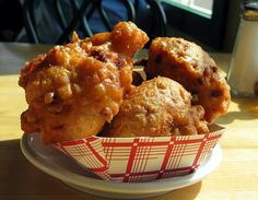 some fried food in a bowl on a table