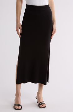 This softly knit skirt is textured with ribbing and rendered in a solid hue for everyday pairing. 50% viscose, 28% polyester, 22% nylon Machine wash, dry flat Imported Chic Ribbed Maxi Skirt For Spring, Ribbed Midi Bottoms For Fall, Stretch Viscose Midi Skirt, Spring Viscose Stretch Skirt, Chic Knit Midi Bottoms, Ribbed Midi Length Bottoms For Fall, Spring Stretch Viscose Skirt, Fall Ribbed Midi Bottoms, Spring Ribbed Stretch Maxi Skirt