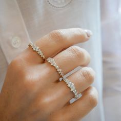 The Diamond Cluster Ring is like wearing a constellation on your finger. Featuring 23 diamonds set in an asymmetric grouping along half of the band, this style adds a twinkle to any stack.