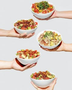 four hands holding bowls filled with different types of food in each bowl, all on top of one another