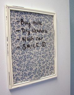 a sign on the wall that says, buy milk dry cleaner wish car smile