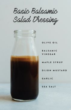 a glass jar filled with liquid sitting on top of a table