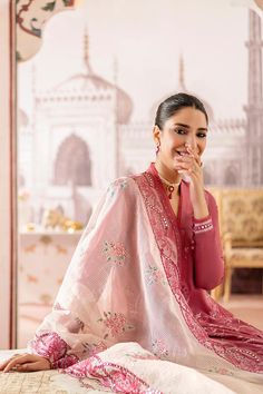 Cross Stitch Pink Pakistani Dress Causal Fabric: LawnColor: PinkWork Details: Embroidered 3PC Set Includes: Shirt: Dyed Embroidered Lawn Front Trouser: Dyed Cambric Trouser Dupatta: Net Embroidered Dupatta This elegant 3-piece ensemble features a beautifully crafted dyed embroidered lawn front shirt, paired with comfortable dyed cambric trousers. The outfit is perfectly complemented by a net embroidered dupatta, adding a touch of grace and sophistication to your overall look. Enjoy the timeless Pink Chanderi Dress With Intricate Embroidery, Pink Salwar Kameez With Resham Embroidery And Long Sleeves, Transitional Pink Dress With Resham Embroidery, Silk Salwar Kameez With Intricate Embroidery In Pink, Pink Silk Salwar Kameez With Intricate Embroidery, Pink Dress With Resham Embroidery For Transitional Season, Pink Long Sleeve Salwar Kameez With Chikankari Embroidery, Pink Floral Embroidery Unstitched Dress, Pink Embroidered Kurta For Eid