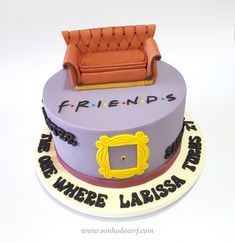 a birthday cake with a couch on top and friends written on the side in black lettering