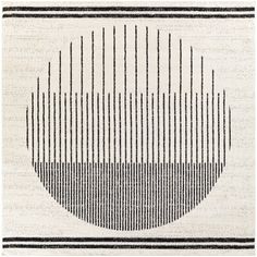 a black and white rug with lines in the shape of a circle on top of it