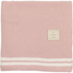 the pink and white striped blanket is folded on top of an empty square, with a tag