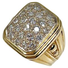 a gold ring with white diamonds on it