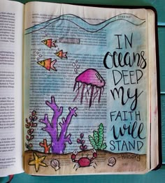 an open bible with the words in oceans deep my faith will stand