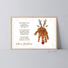 a christmas card with a reindeer's hand and the words merry christmas on it