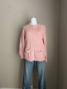 Stunning pink merino wool cardigan. *100% irish wool, by aran crafts *length: 26" *bust total: 40"- lots of stretch- tagged a small but a medium COULD fit too- this is a roomy small *very soft wool *no flaws to note *shoulders: 15" *sleeve: 25" *boxy in cut, two pockets In excellent condition. *all sales final, convo with any questions* Classic Pink Cable Knit Sweater, Pink Long Sleeve Wool Cardigan, Vintage Pink Knit Cardigan, Irish Cardigans, Scandinavian Clothing, Clothing Aesthetic, Merino Wool Cardigan, Soft Wool, Wool Cardigan