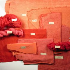 red and orange color samples with labels on them