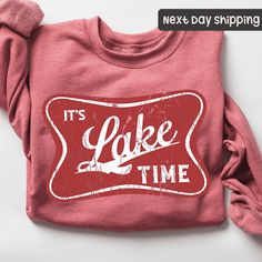 It's Lake Time  Sweatshirt, Perfect for Lake Life, Camping, and Lake House Retreats, Trendy Gift for Nature Lovers, Boating Sweatshirt Unisex Sweatshirt How to place an order: 1-Swipe to all of the pictures. 2-Select style and size from drop down menus (t-shirt, sweatshirt or tote-bag) 3-Select colors from drop down menus. 4-Select quantity. 5-Add to Cart For every single order you have to repeat every step.. Final Step-Check Out (Double-check your address information) MATERIAL T-shirts: Solid C Funny Lake Shirts, Lake Apparel, Lake Clothes, Fabric Outfits, Lake Shirts, Lake Wear, Lake Lifestyle, Lake Life Shirt, Beer Fridge