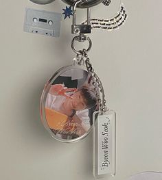 a keychain with an image of a man on it