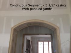 an open doorway with the words continuous segment 3 1 / 2 casing with paneled jambs