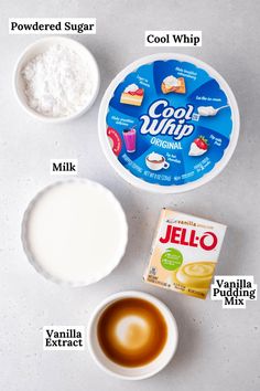 ingredients needed to make an ice cream dessert on a white counter top, including yogurt, vanilla milk, and cool whip