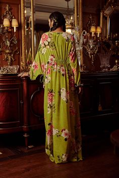 Editor's Note Featuring a hand painted and printed kaftan in effervescent pops of vigorous colour, gathered on the front. Fabric: Crepe Color: Green Components: Kaftan Occasion: Daywear and resort Disclaimer: Product color may slightly vary due to photographic lighting sources or your monitor setting. Care: Dry Clean Only About the Designer Kalista is a luxury fashion label that specializes in designer clothing for millennial women. Founded by fashion designer turned entrepreneur, Pratyush Gugla Green Kaftan, Kaftan For Women, Sharara Set, Embroidered Neckline, Contemporary Outfits, Purple Velvet, Kaftan Dress, Floral Motifs, Fashion Stylist