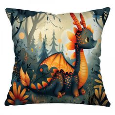 a pillow with an orange dragon sitting on it's side in the woods at night