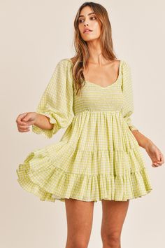 -Color: Lime -3/4 Sleeve -Lightweight -Gingham print -Ruffle tier -Smocked bust -Lined -Content: 51% Cotton 49% Polyester; Lining 95% Polyester 5% Spandex -Hand wash/Line dry -Imported -Model is 5'9" and wearing size Small Honey Shop, Babydoll Mini Dress, Country Dresses, Gingham Print, Gingham Dress, Lemon Lime, Amelie, Trendy Dresses, Dance Dresses