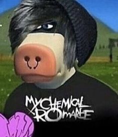 a close up of a stuffed animal wearing a t - shirt with the words my chemical romance on it