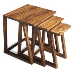 three wooden tables sitting on top of each other