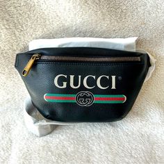 The Gucci Logo Belt Bag In Black Leatheris Crafted From A Grained, Pebbled Calfskin Leather In Italy. This Supple, Yet Durable Belt Bag Doubles As A Messenger Bag And Features The Vintage Gucci Logo, A Webbed, Adjustable Strap, And Zipper Pouch. Gucci Logo Belt Bag In Black Leather Aged Gold-Tone Hardware 100% Grained Calfskin Leather Belt Bag, Messenger Bag Front Zip Closure Vintage Logo Webbed, Adjustable Strap Spacious Interior Size 90 Product Number 527792 Made In Italy Gucci Black Bag With Removable Pouch, Black Gucci Bag With Removable Pouch, Gucci Black Crossbody Bag, Gucci Business Bag With Logo, Black Gucci Pouch Bag, Luxury Bags With Designer Logo, Luxury Designer Logo Bags For Daily Use, Black Gucci Bags With Branded Hardware, Black Gucci Bag With Logo