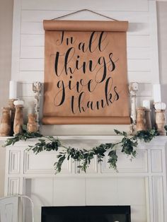 a fireplace mantel with a sign that says, i'm all things give thanks