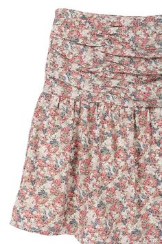 Flirty Summer Floral Shirred Waist Skirt The Flirty Summer Floral Shirred Waist Skirt is a charming addition to your summer wardrobe. With its floral print pattern, this skirt exudes a playful and feminine vibe, perfect for sunny days. The shirred waist provides a flattering and comfortable fit, while the stretch fabric ensures ease of movement. The skirt is lined, ensuring no see-through, adding to its practicality and versatility. Pattern Type: Floral print Stretch: Stretch Sheer: Lined, no se Feminine Floral Mini Skirt For Spring, Spring Floral Mini Skirt, Knee-length Floral Print Skirt For Garden Party, Summer Floral Print Mini Bottoms, Floral Print Mini Skirt For Garden Party, Feminine Floral Print Summer Skirt, Floral Mini Skirt For Garden Party, Feminine Floral Mini Skirt, Floral Print Mini Skirt For Summer