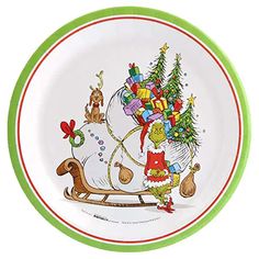 a christmas plate with an image of santa riding a sleigh and presents on it