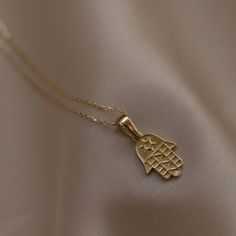 14k Real Yellow Gold Hamsa Hand of Fatima Pendant Special Design Luck Charm Dainty Gift for Women Fine Jewelry Valentine's Day by Monsini Available in 4 different chain lengths : 42 cm (16.5 in) 44 cm (17.3 in) 46 cm (18.1 in) 48 cm (18.8 in) Hamsa Pendant Length : 1.8 cm (0.70 in) Hamsa Pendant Width : 0.9 cm (0.35 in) Handmade Item Special Design, ❤【DESIGN】This 14K Gold Yellow Hamsa necklace Good Luck and health for Women, Is hased on the evil eye mentioned in ancient greek literatures as well Elegant Handmade 14k Gold Charm Necklaces, Elegant Handmade 14k Gold Charm Necklace, Luxury Handmade 14k Gold Necklaces, Handmade 14k Gold Necklace For Formal Occasions, Formal Handmade 14k Gold Necklace, 14k Gold Pendant Necklace For Celebration, Traditional 14k Stamped Necklace As Gift, 14k Gold Symbolic Necklace For Wedding, Traditional 14k Stamped Necklace For Gift