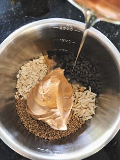 the ingredients for peanut butter in a mixing bowl