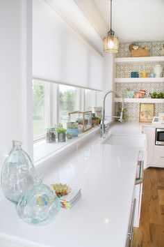 the kitchen is clean and ready to be used for cooking, baking, or eating