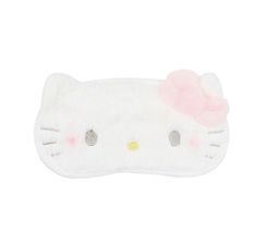 a white hello kitty sleeping mask with pink ears