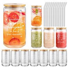 a set of six mason jars filled with different types of drinks and strawberries in each jar