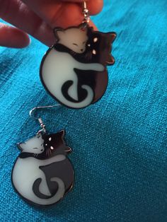 Earrings with two cute cats cuddling. The perfect accessory for all cat lovers. The cats are black/white and 3.5 cm tall. White Cat Design Jewelry With Cat Ears, Cute Black Cat Design Earrings, White Cat Design Earrings, Gift Registry, Cute Cats, Cat Lovers, Favorite Jewelry, Jewelry Earrings Dangle, Dangle Drop Earrings