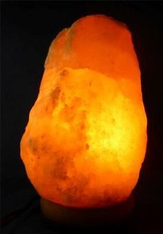 a large orange rock sitting on top of a table