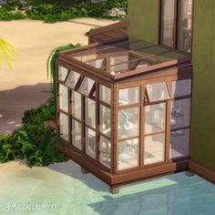 an animated image of a small house in the middle of some plants and sand area