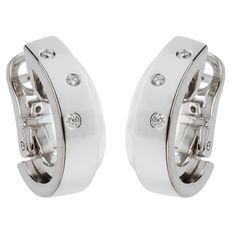 Piaget Possesion Diamond White Gold Hoop Earrings 0001905 Elegant White Gold Diamond Earrings With Tension Setting, Elegant White Gold Earrings With Tension Setting, Luxury Silver Huggie Earrings With Polished Finish, Modern Silver Huggie Earrings With Brilliant Cut, Modern White Gold Huggie Earrings For Formal Occasions, Luxury Diamond White Hoop Earrings With Channel Set, Luxury Diamond White Earrings With Channel Set, Luxury Silver Hoop Earrings With Single Cut Diamonds, Luxury Diamond White Channel Set Earrings