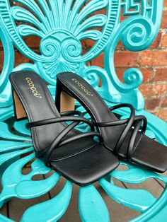 Get ready to strut your stuff in style with the Jenna Square Toe Strappy Heels! These black heels are perfect for any occasion, with their comfortable low heel and trendy strappy design. Take your outfit to the next level with these must-have heels! Trendy Black Heels With Heel Strap, Black Low Heel Spring Heels, Trendy Strappy Heels With 4-inch Heel, Black Low Heel Heels For Spring, Trendy Low Heel Sandals For Night Out, Trendy Black Low Heel Sandals, Trendy Black Heels With Heel Loop, Trendy Black Low Heel Heels, Chic Strappy Heels With Stacked Heel