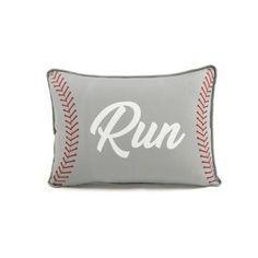 a baseball pillow with the word run on it