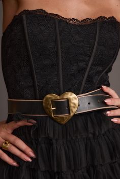 A belt to go with your rose colored glasses for our lover girls out there. Made from 100% genuine leather, and featuring a gold heart belt buckle, this cute accessory is about to transform your sweater dresses and jeans. **ALL ACCESSORIES ARE FINAL SALE** Fall Bottoms, Heart Belt, Concert Top, Party Bottoms, Concert Dresses, Fall Sweater Dress, Denim And Diamonds, Colored Glasses, Bridal Tops