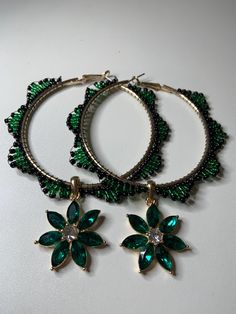 Seed bead hoop earrings with a cute flower charm. Seed Bead Hoop Earrings, Flower Hoop Earrings, Bead Hoop Earrings, Cute Flower, Black Flower, Beaded Hoop Earrings, Beaded Hoops, Flower Charm, Green And Black