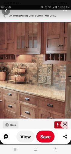 a kitchen with wooden cabinets and tile backsplashes on the counter top, along with an instagram message