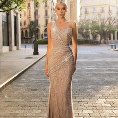 Gorgeous Catwalk Couture Dress. I Bought This Dress Thinking It Was A Gold Colour But It Is More Of A Silver/White Beading With A Light Pink Undertone. On The Website It Lists For 650 But After Tax And Shipping It Cost Me 750. My Loss Is Your Gain. Https://Catwalkcouture.Com/Products/27 Gold White Dress, Pink And Silver Dress, Floor-length Silver Hand Embellished Dress, Luxury Silver V-neck Evening Dress, Embellished Silver Floor-length Gown, Silver V-neck Maxi Dress For Evening, Catwalk Couture, Glamorous Metallic V-neck Maxi Dress, White Gold Dress