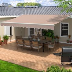 an outdoor dining area with patio furniture and potted plants