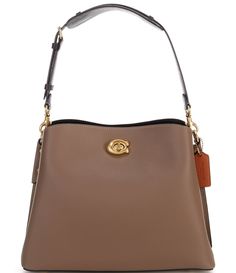 From COACH&#x2C; the Willow Colorblock Leather Shoulder Bag features:Polished pebble leatherTurn-lock closureInside snap pocketCenter zip compartmentDetachable handle Detachable strap for shoulder or crossbody wearFour protective feet at baseApprox. 12.5" L x 9" H x 4.5" W bag; 6" handle drop; 21.5" strap dropImported. Brown Business Shoulder Bag With Snap Closure, Coach Brown Pebbled Leather Bag, Brown Pebbled Leather Coach Bag, Brown Business Bags With Snap Closure, Brown Office Bag With Snap Closure, Brown Coach Bag With Turn-lock Closure, Coach Willow, Designer Shoulder Bag, Tan Handbags