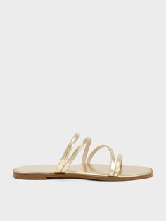 Trendy Gold Flip Flops For Summer, Casual Gold Flip Flops For Spring, Casual Gold Slides For Vacation, Gold Flat Mules For Spring, Elegant Summer Vacation Slides, Gold Flat Slides For Summer, Gold Open Toe Sandals For Spring, Chic Summer Party Slides, Gold Flat Slides For Beach