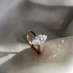 2 Ct Marquise Cut Moissanite Engagement Ring, Wedding Ring, Marquise Cut Ring, Elongated Marquise, Hidden Halo Luxury Ring for Her ✥ 𝐌𝐚𝐢𝐧 𝐒𝐭𝐨𝐧𝐞 𝐃𝐞𝐭𝐚𝐢𝐥𝐬 ↣ Shape: Marquise Cut ↣ Type: Moissanite ↣ Weight: 2 Ct (App.) ↣ Color: Colorless ↣ Clarity: VVS ↣ Side Stone: Moissanite ↣ Making Process: Handmade - Crafted by our experienced team ✥ 𝐑𝐢𝐧𝐠 𝐃𝐞𝐭𝐚𝐢𝐥𝐬 ↣ Band Width: 1.6 mm (± 0.10) [Customization Possible] ↣ Metal Purity: Solid Gold (10KT, 14KT, 18KT); Silver (925 Sterling) Aries Ring, Wedding Ring Marquise, Gallery Rail, Marquise Cut Rings, Signature Rings, Luxury Ring, Ring Marquise, Basket Setting, Marquise Ring