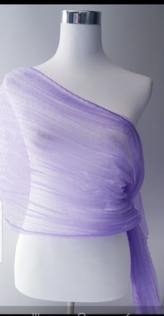 Purple Shawl in organza silk material with a shimmery shine. To achieve the crinkled / crushed look the shawl is twisted whilst wet and tied with a rope and left to dry. Beautiful shawl, will make any outfit look glamorous.  Keep it or gift it.  Care Instructions Hand wash mild detergent Hang to dry naturally  Crush will remain as long as you don't iron. If you want to remove the crush affect on shawl just iron with cloth on top.  Plz note, once ironed the crush affect will not return. Thank you Purple Shawl, The Crush, Purple Wrap, Purple Scarf, Bridal Shawl, Purple Scarves, Wedding Wraps, Silk Material, Purple Wedding